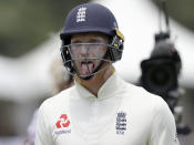 England's Ben Stokes reacts as he leaves the field after he was dismissed for 91 runs during play on day two of the first cricket test between England and New Zealand at Bay Oval in Mount Maunganui, New Zealand, Friday, Nov. 22, 2019. (AP Photo/Mark Baker)