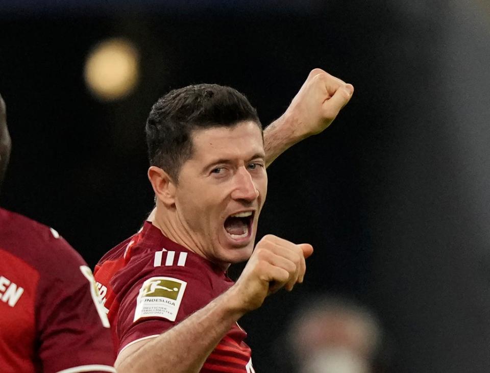 Robert Lewandowski scored his 60th goal of 2021 in Bayern Munich’s Bundesliga win on Saturday (Matthias Schrader/PA) (AP)