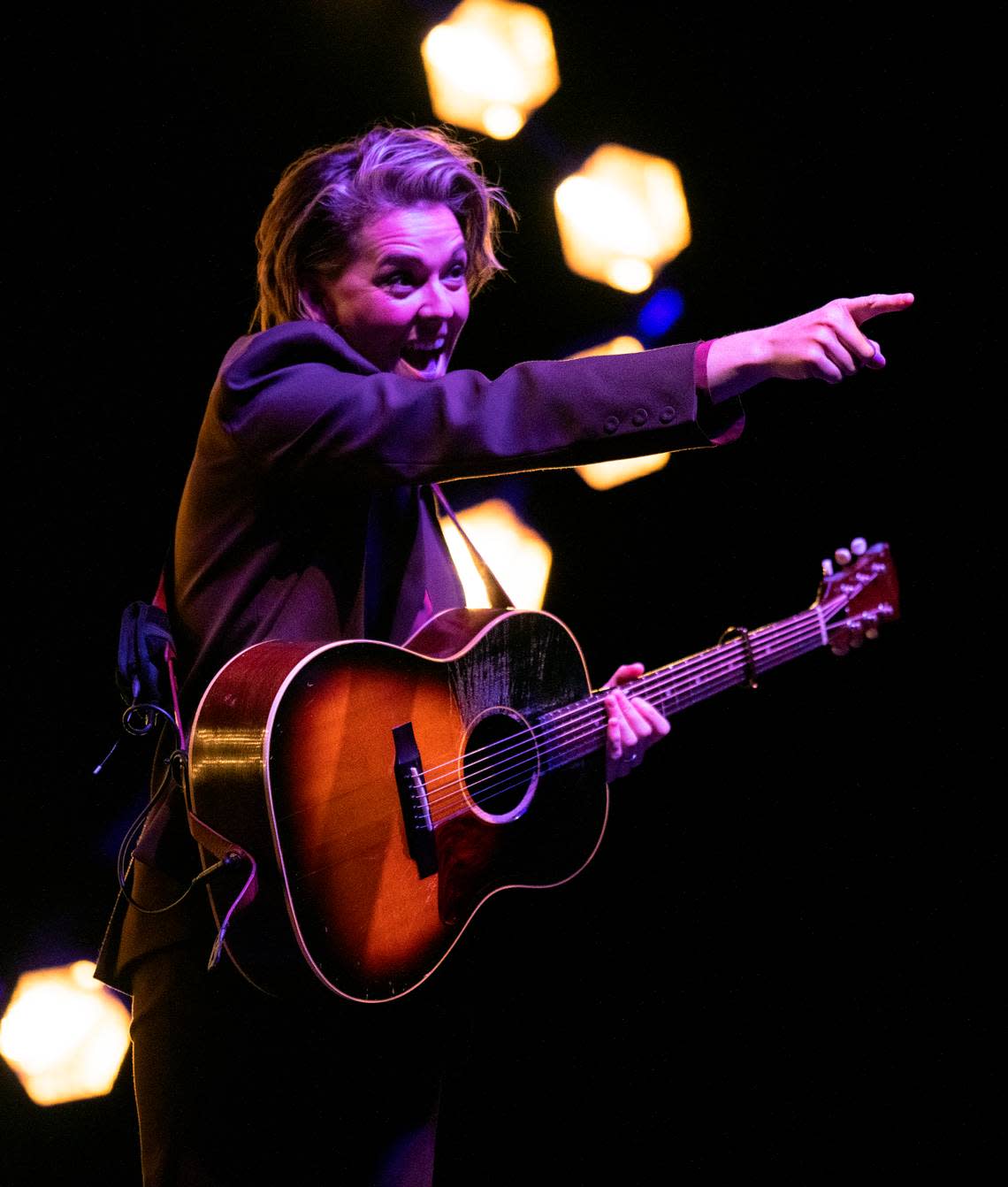 Brandi Carlile acknowledges the crowd as she takes the stage for a special solo concert at DPAC in Durham, N.C., Friday night, Oct. 7, 2022.