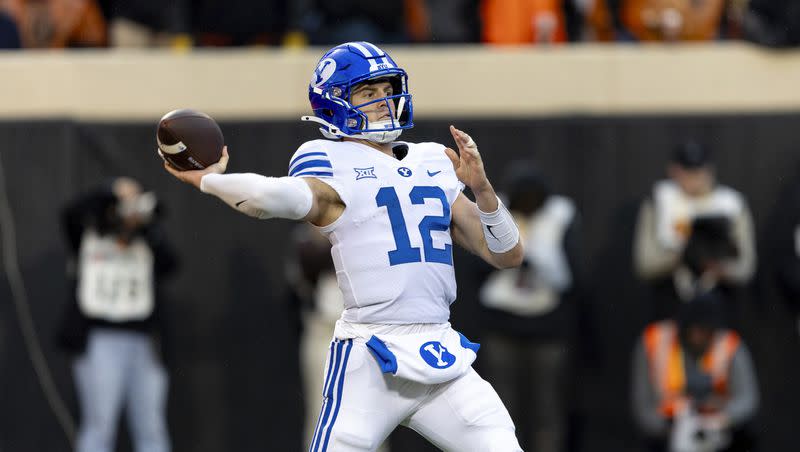 BYU quarterback Jake Retzlaff (12) passes the ball in the first half of an NCAA college football game against Oklahoma State Saturday, Nov. 25, 2023, in Stillwater, Okla. 