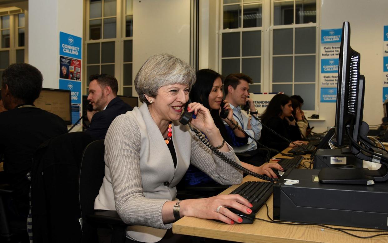 Theresa May visited a Conservative campaign phone bank and spoke to voters on Thursday evening before polls closed - Steve Back Photographer 07884436717 ; steve@steveback.com