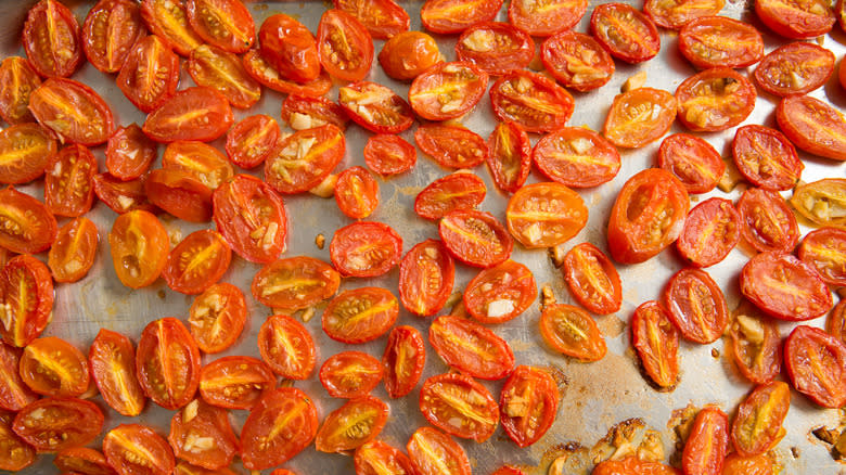 roasted tomatoes on baking sheet