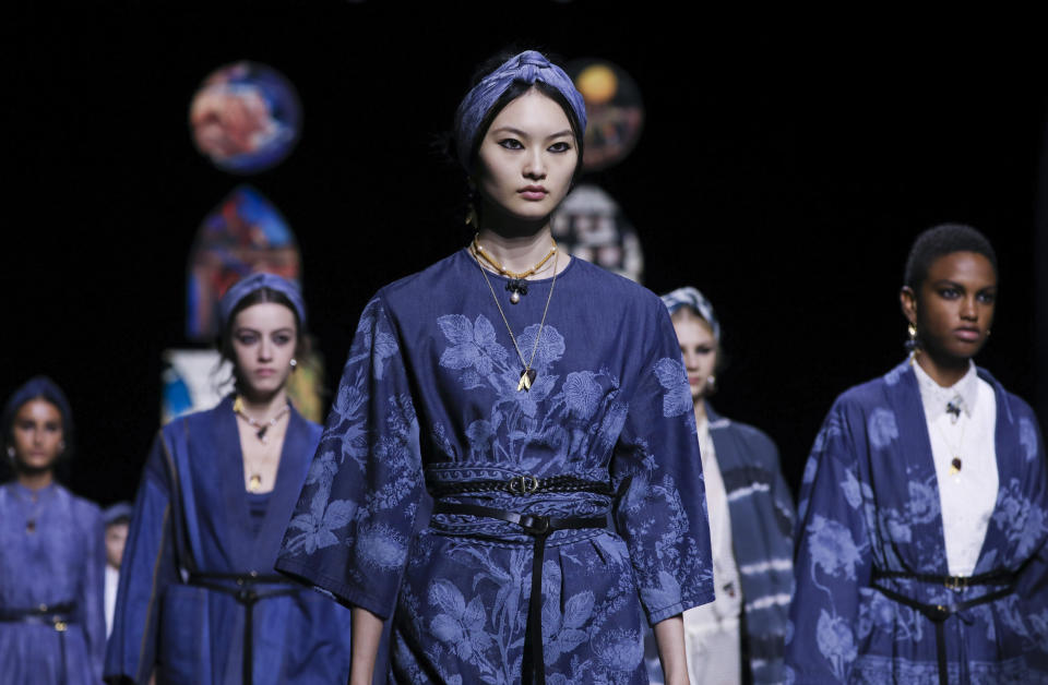 Models wear creations for Dior's Spring-Summer 2021 fashion collection, Tuesday, Sept. 29, 2020, during Paris fashion week. (Photo by Vianney Le Caer/Invision/AP)