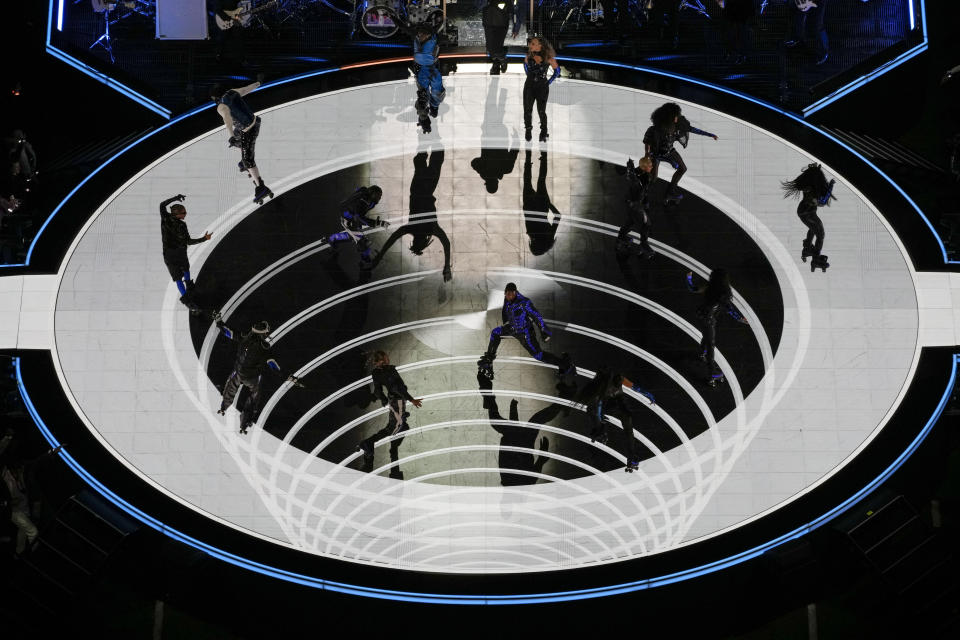 Usher, center, performs during halftime of the NFL Super Bowl 58 football game between the San Francisco 49ers and the Kansas City Chiefs Sunday, Feb. 11, 2024, in Las Vegas. (AP Photo/David J. Phillip)