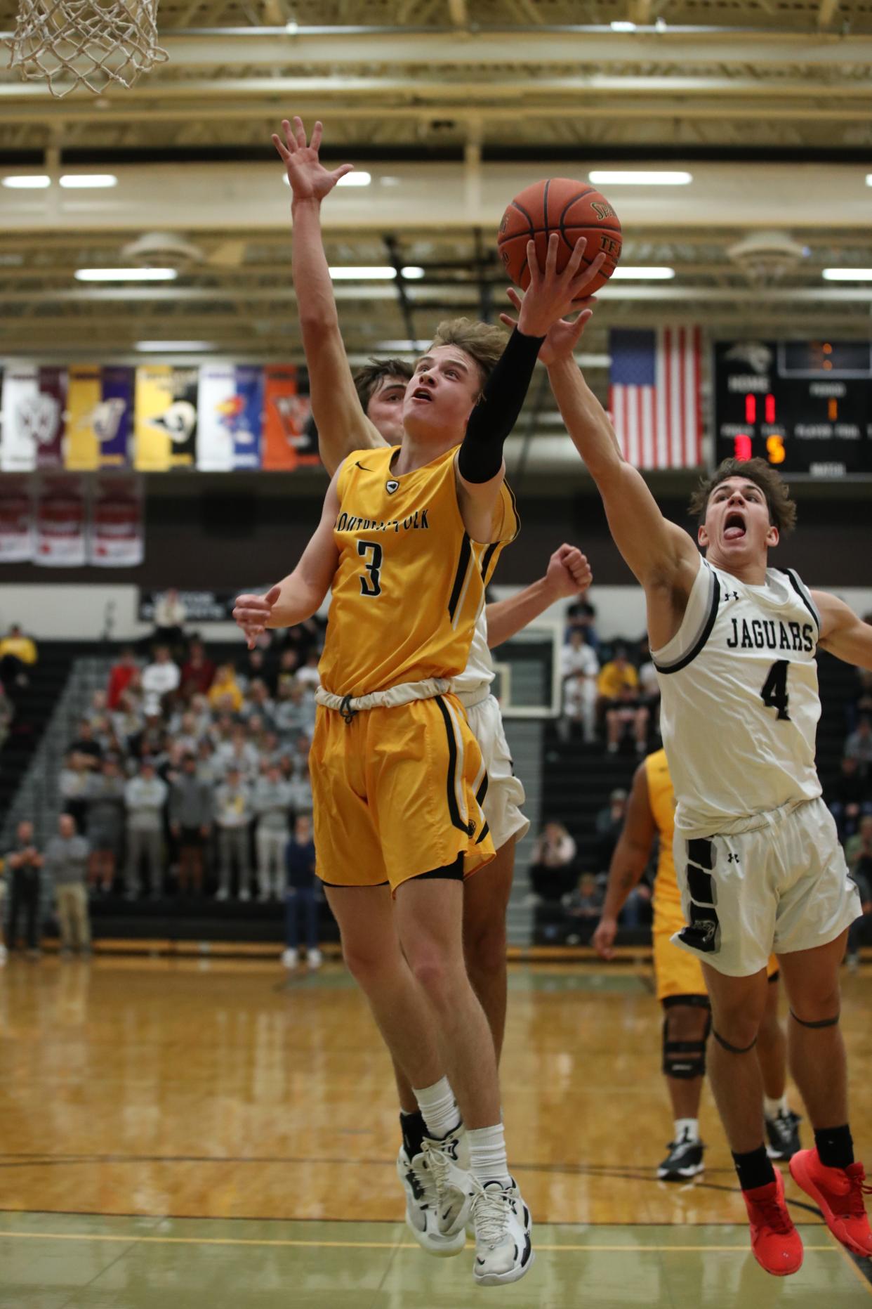 Southeast Polk's Riley Edwards (3) shoots a lay-up against Ankeny Centennial on Nov. 30 in Ankeny.