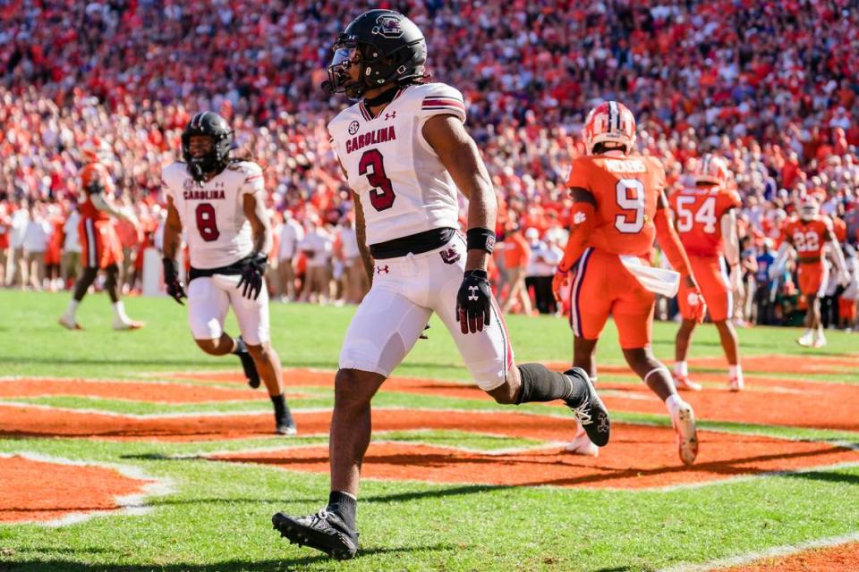 South Carolina wide receiver Antwane Wells Jr. (3) celebrates after scoring a touchdown in the first half of an NCAA college football game against Clemson on Saturday, Nov. 26, 2022, in Clemson, S.C.
