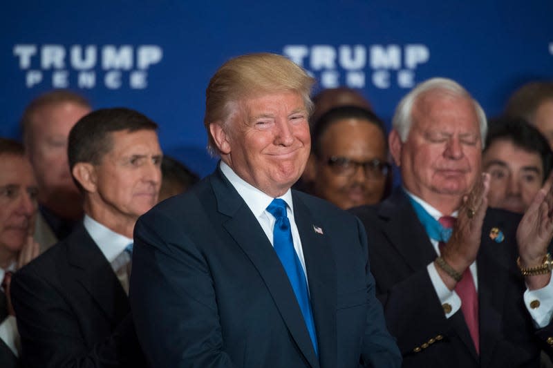 UNITED STATES - SEPTEMBER 16: Republican presidential candidate Donald Trump attends a campaign event with veterans at the Trump International Hotel on Pennsylvania Ave., NW, where he stated he believes President Obama was born in the United States, September 16, 2016. Medal of Honor recipient Mike Thornton, appears at right. (