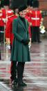 <p>In 2013, despite being pregnant with Prince George, Kate slipped into the same Emilia Wickstead coat she had worn the year before. She layered the look with a black high neck top, and accessorised with a black hat and Emmy London pumps. (Photo: PA) </p>