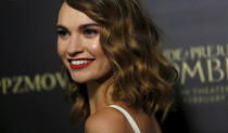 Cast member Lily James poses at the premiere of "Pride and Prejudice and Zombies" in Los Angeles, California January 21, 2016. REUTERS/Mario Anzuoni