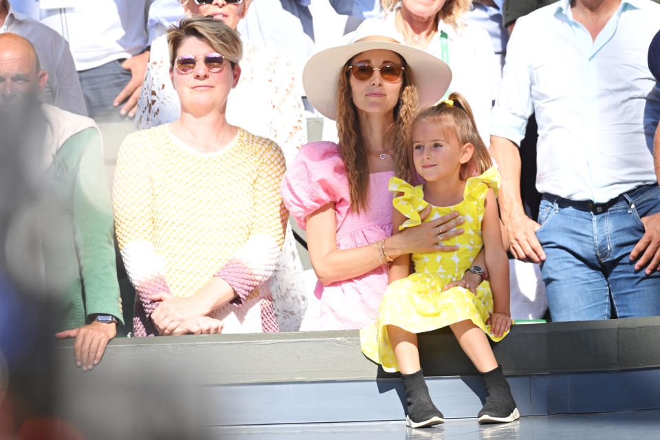 Jelena Djokovic, pictured here with daughter Tara at Wimbledon.