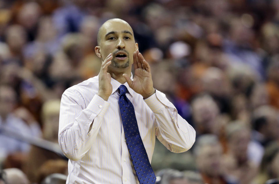 Shaka Smart and the Longhorns let their emotions show after a difficult day in Austin. (AP)