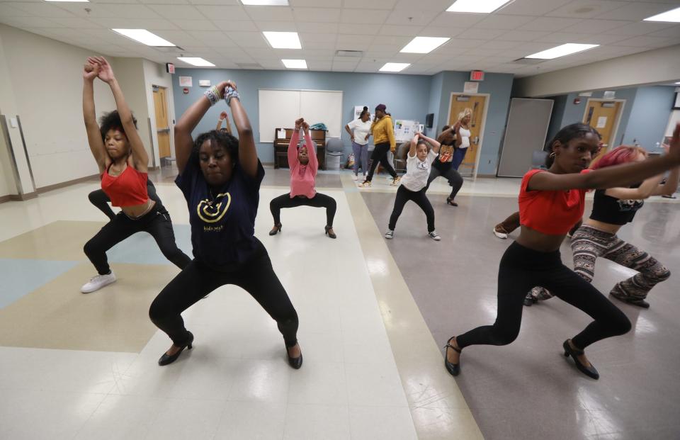 Roc Royals Step & Dance team practice for their show at the David F. Gantt Community Center on North St. Leading the group during this section of the dance are Kamorha Mimms and Jamari Herring.