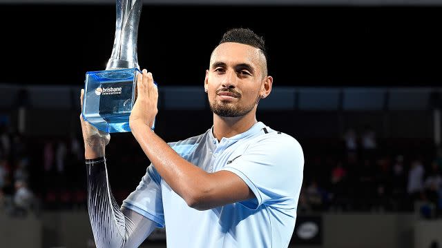 Kyrgios and his prize. Image: Getty