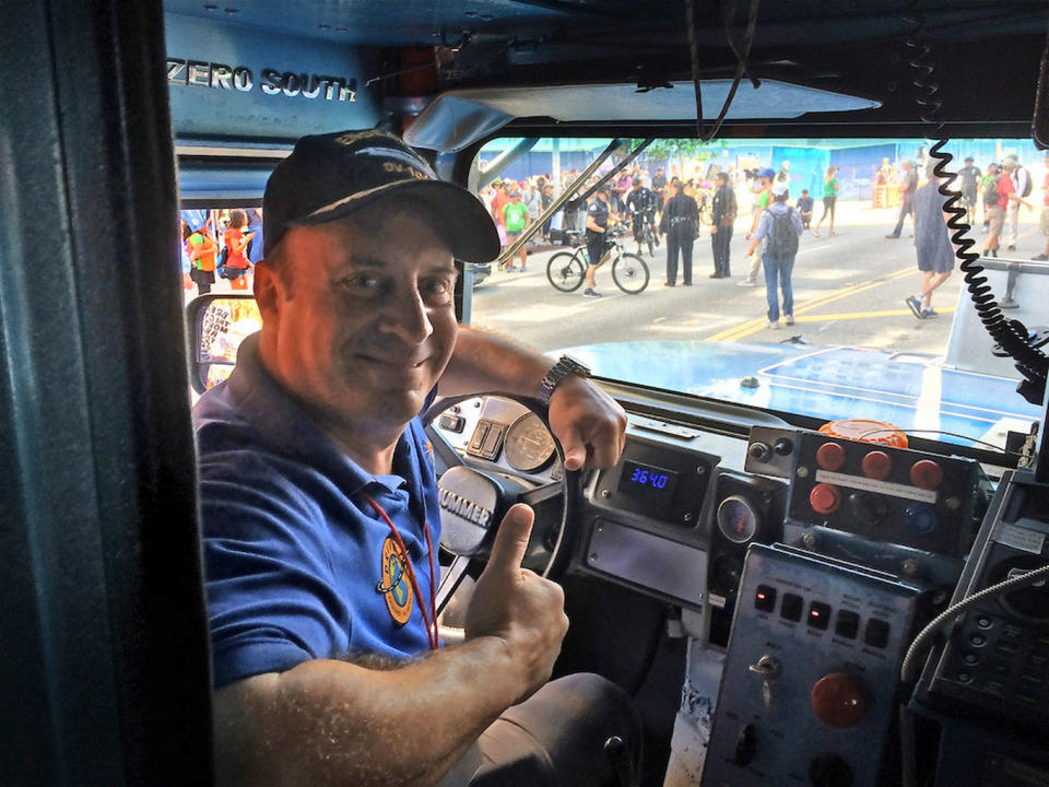 Former NASA astronaut Garret Reisman drove an electric-powered Hummer to lead the March for Science Los Angeles on April 22, 2017. <cite>Calla Cofield/Space.com</cite>