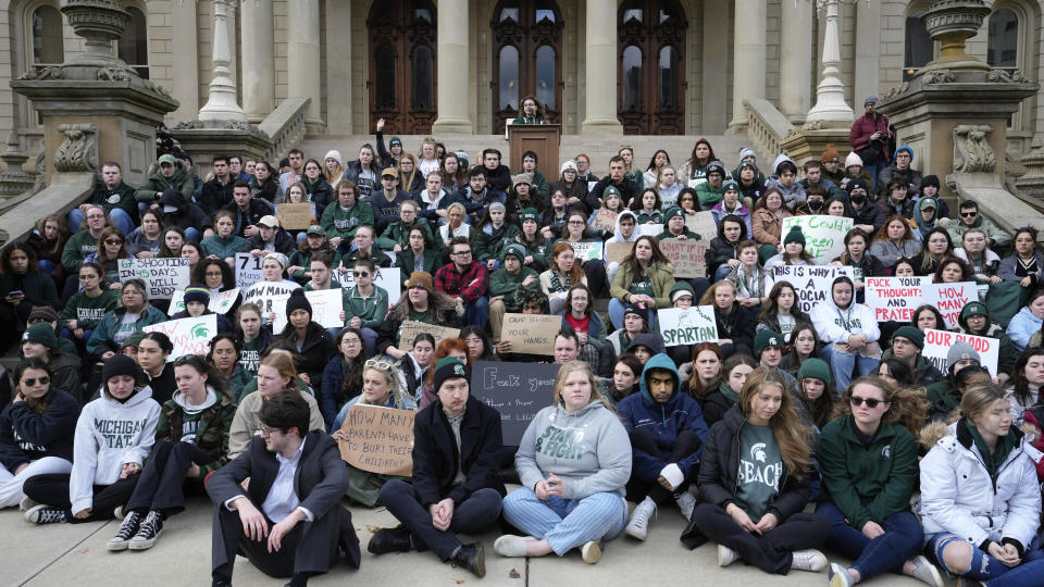 Current and former Michigan State University students rally at the capitol in Lansing, Mich., Wednesday, Feb. 15, 2023. Alexandria Verner, Brian Fraser and Arielle Anderson were killed and five other students remain remain in critical condition after a gunman opened fire on the campus of Michigan State University Monday night. (AP Photo/Paul Sancya)