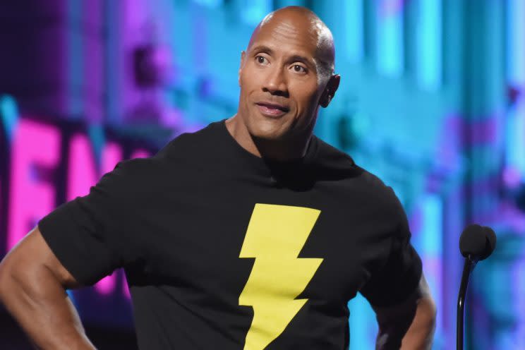 Dwayne Johnson in black T-shirt with yellow lightning bolt