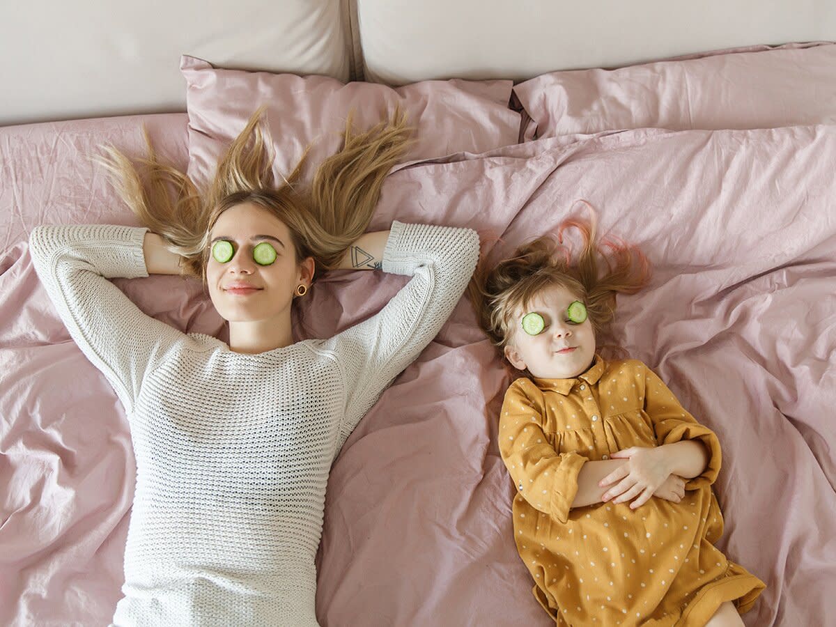 Mother and daughter relax at home like in spa