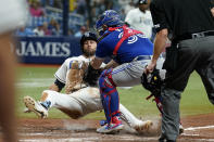Toronto Blue Jays catcher Alejandro Kirk (30) tags out Tampa Bay Rays' Kevin Kiermaier trying to score during the sixth inning of a baseball game Monday, Sept. 20, 2021, in St. Petersburg, Fla. (AP Photo/Chris O'Meara)