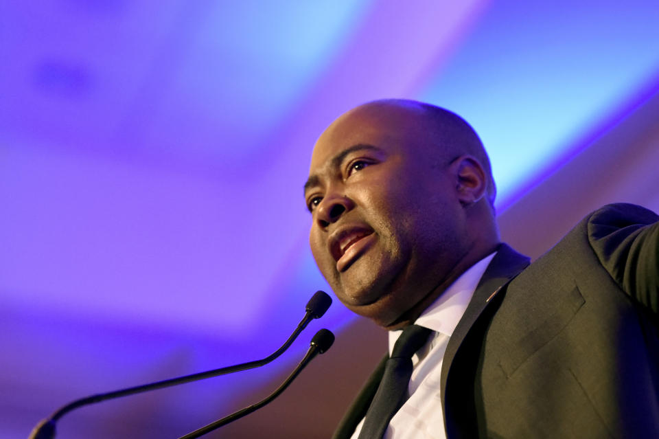 FILE- In this Feb. 24, 2020 file photo, Democratic Senate candidate Jaime Harrison, who is challenging U.S. Sen. Lindsey Graham, R-S.C., speaks at a South Carolina Democratic Party dinner in Charleston, S.C. Harrison formally endorsed Joe Biden's bid for the Democratic presidential nomination, calling the former vice president "a longtime friend to the people of South Carolina." (AP Photo/Meg Kinnard, File)