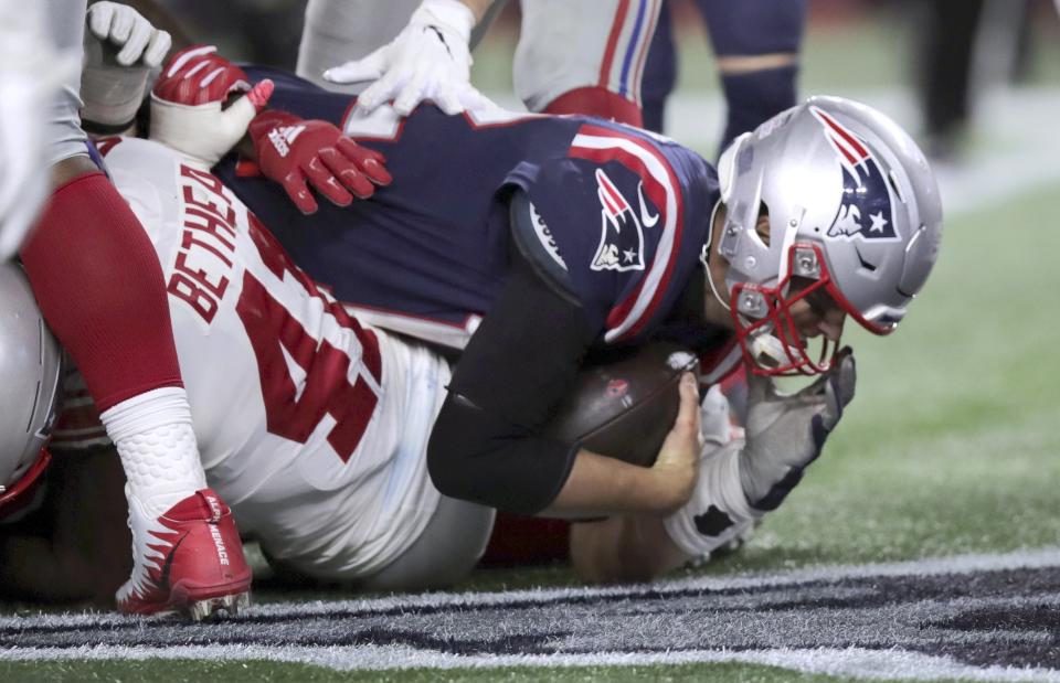 New England Patriot quarterback Tom Brady scores a touchdown in the second half of an NFL football game against the New York Giants, Thursday, Oct. 10, 2019, in Foxborough, Mass. (AP Photo/Charles Krupa)