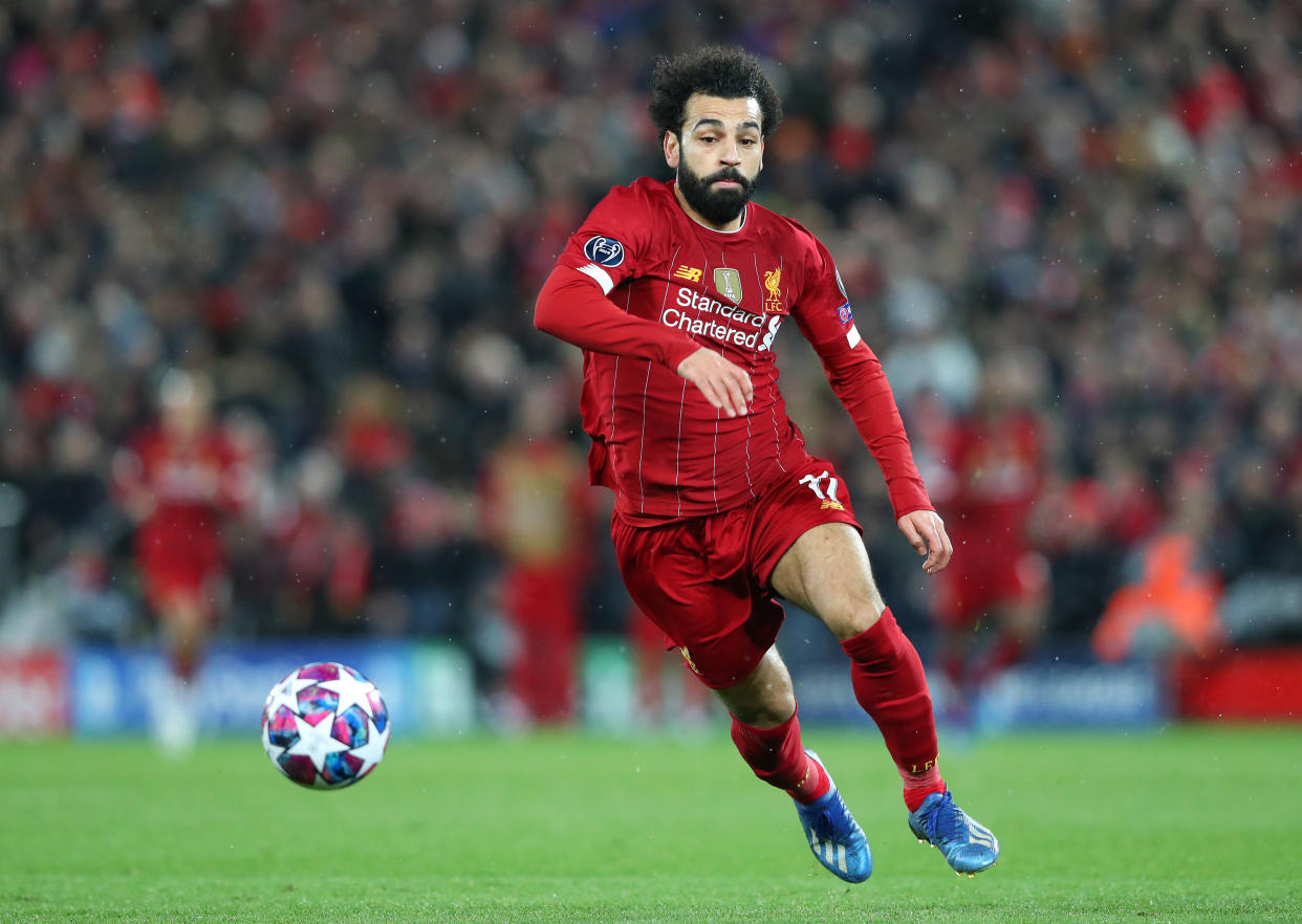 LIVERPOOL, ENGLAND - MARCH 11:  Mohamed Salah of Liverpool chases the ball during the UEFA Champions League round of 16 second leg match between Liverpool FC and Atletico Madrid at Anfield on March 11, 2020 in Liverpool, United Kingdom. (Photo by Alex Livesey - Danehouse/Getty Images)