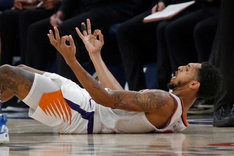 Phoenix Suns guard Cameron Payne celebrates his 3-point field goal, on which he was fouled by a Minnesota Timberwolves player during the fourth quarter of an NBA basketball game Wednesday, Nov. 9, 2022, in Minneapolis. The Suns won 129-117. (AP Photo/Bruce Kluckhohn)