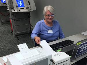 A Catawba Co., NC, poll worker issues a ballot using the ExpressVote Printer. The printer allows poll workers to quickly issue voters their correct ballot when checking in to vote.