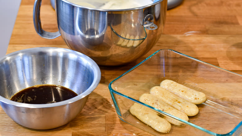 soaked ladyfingers next to espresso