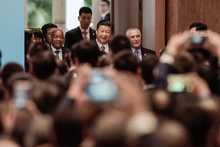 (L-R) South African President Jacob Zuma, Chinese President Xi Jinping, and Brazilian President Michel Temer arrive for the opening ceremony of the BRICS Business Forum in Xiamen, China September 3, 2017. REUTERS/Fred Dufour/Pool