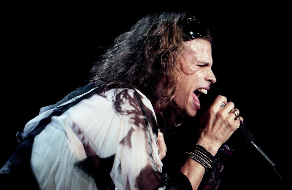 Aerosmith lead singer Steven Tyler belts out one of the group’s hit songs during their Nine Lives Tour concert before a sold-out crowd of 18,183 at Starwood Amphitheatre on Sept. 29, 1998.