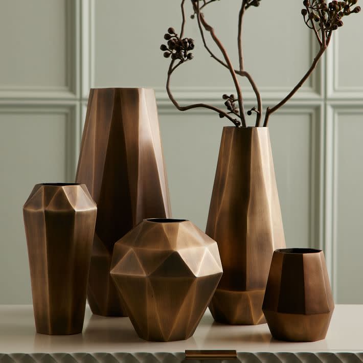 <p><a href="https://go.redirectingat.com?id=74968X1596630&url=https%3A%2F%2Fwww.westelm.com%2Fproducts%2Ffaceted-metal-vases-d3402&sref=https%3A%2F%2Fwww.bestproducts.com%2Fhome%2Fg42362877%2Fwork-from-home-setup-ideas%2F" rel="nofollow noopener" target="_blank" data-ylk="slk:Shop Now;elm:context_link;itc:0;sec:content-canvas" class="link ">Shop Now</a></p><p>Faceted Antique Brass Metal Vases</p><p>westelm.com</p><p>$1.00</p>