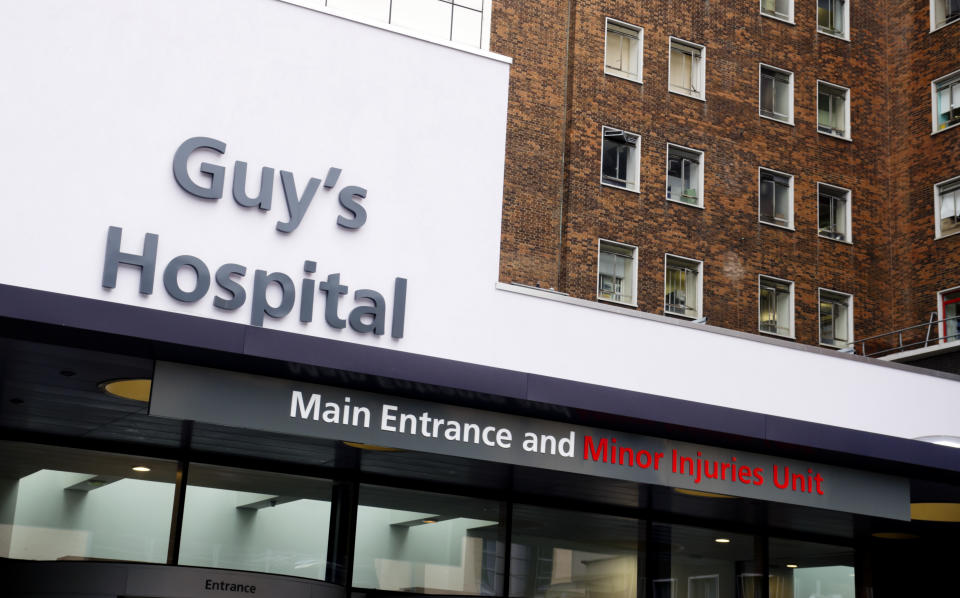 "London, England - May 10, 2012: Main Entrance and Minor Injuries Unit signs at Guy's Hospital, in Southwark, South London. Guy's was founded by Thomas Guy in 1721 as a hospital to treat incurable patients who had been released from the nearby St Thomas' Hospital. It has grown enormously since its foundation and is now merged with St Thomas' to form the Guy's and St Thomas' NHS Foundation Trust. It is one of the most famous hospitals in the UK. (Overcast day.)"