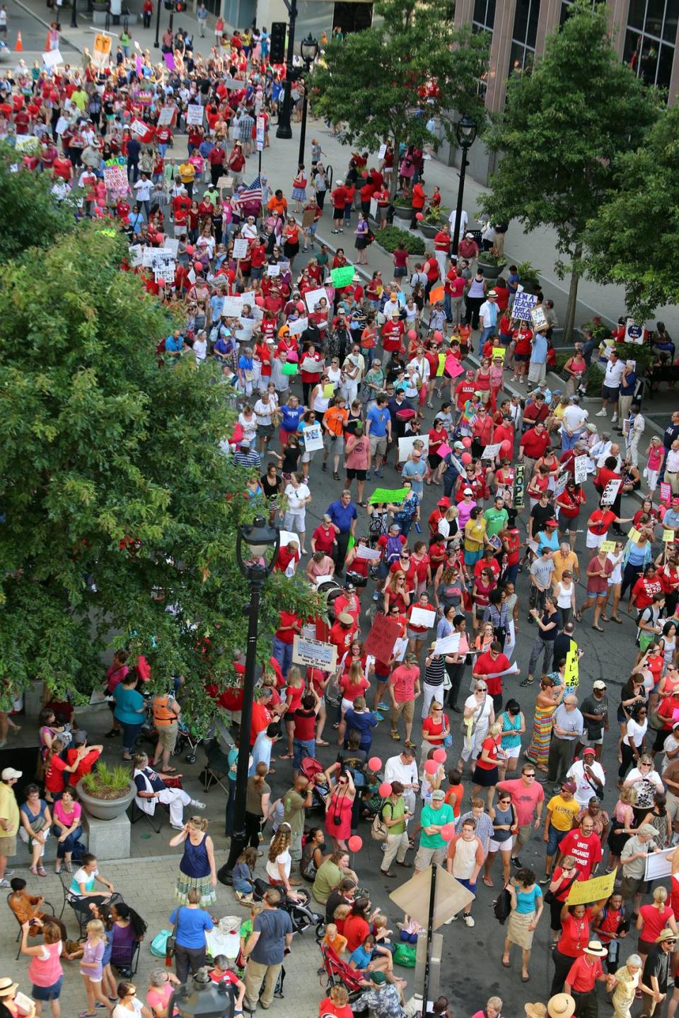 Thousands of protestors march down Fayetteville Street at the final Moral Monday demonstration on Monday, July 29, 2013 in downtown Raleigh.