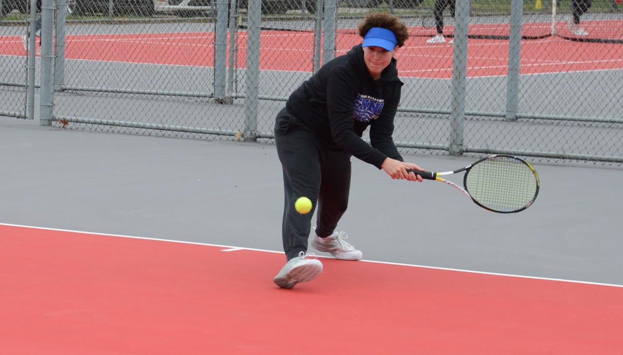 Gibraltar Carlson's Addyson Brake hits a shot at No. 1 singles during a tennis match on Wednesday, April 24, 2024. Bedford beat Carlson 5-3.