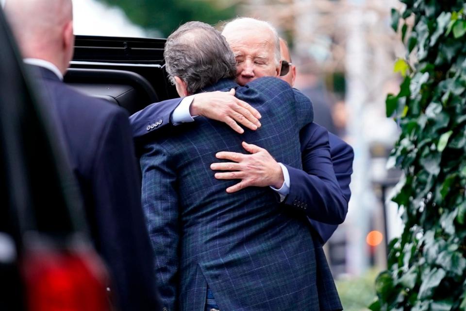 PHOTO: President Joe Biden, right, hugs his son Hunter Biden on Hunter's birthday after dining at The Ivy in Los Angeles, Sunday, Feb. 4, 2024. (Stephanie Scarbrough/AP, FILE)