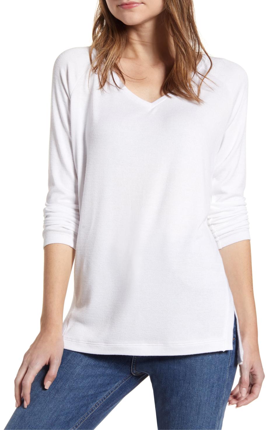 A classic white v-neck tunic will take you through multiple seasons. 