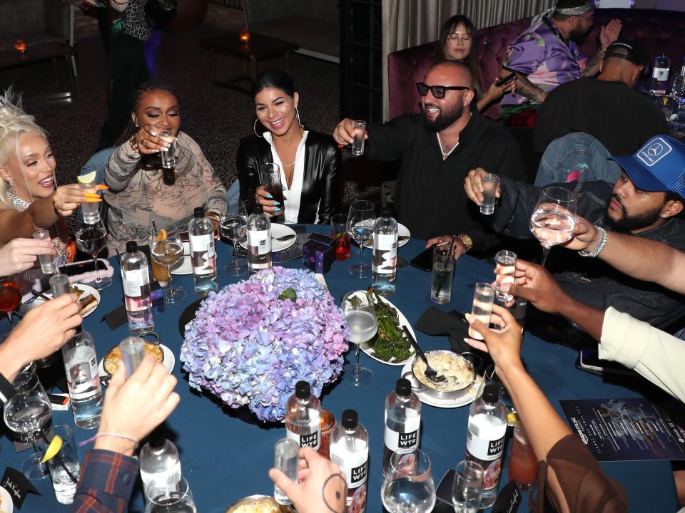 Doja Cat, Lydia Asrat, Rima Fakih Slaiby, Sal Slaiby and The Weeknd celebrate Doja Cat's "Planet Her" Album during dinner at Beauty & Essex on June 24, 2021 in Los Angeles, California