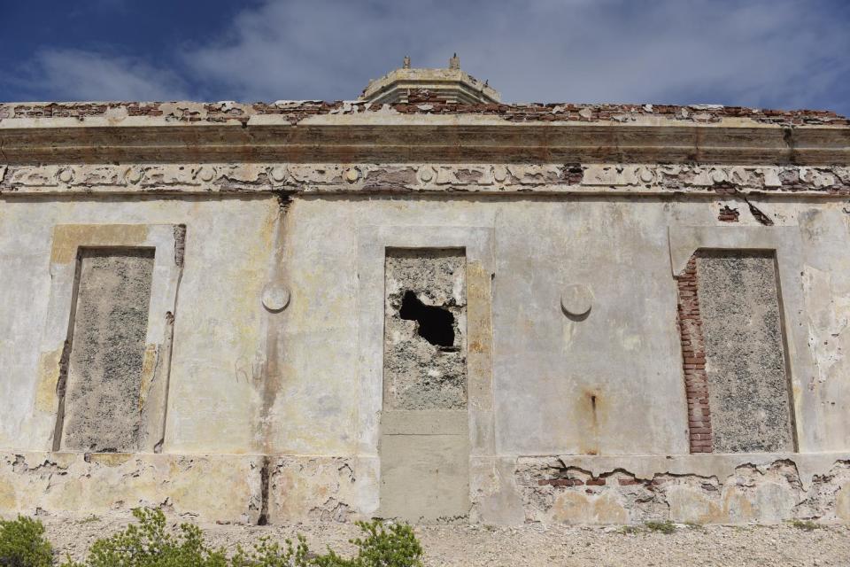 This Jan. 13, 2017 photo, shows the Ferro Port lighthouse at Verdiales Key point on the south coast of Vieques island, Puerto Rico. Tourists this year expect to get access to parts of a zone in western Vieques that once served as a munitions storage depot. (AP Photo/Carlos Giusti)