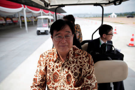 Mitsubishi CEO Osamu Masuko sits on a golf car during a plant tour at the Mitsubishi car factory in Bekasi, West Java province, Indonesia April 25, 2017. REUTERS/Beawiharta