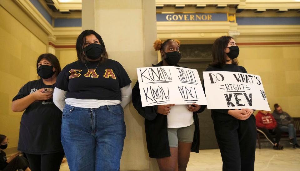 Julius Jones supporters stand vigil outside Gov. Kevin Stitt's office on Tuesday at the Oklahoma Capitol.