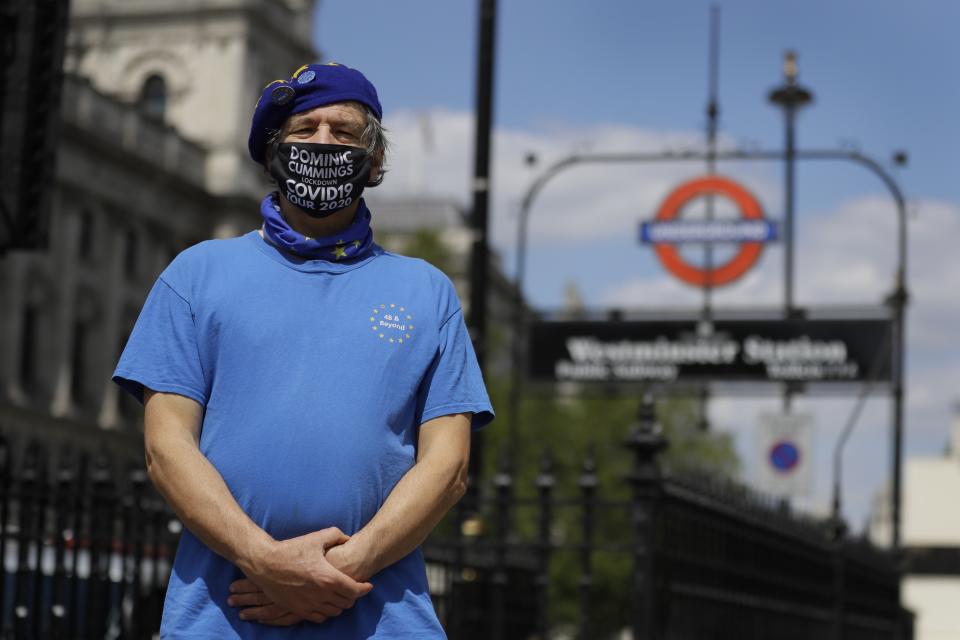 Steve Rouse poses for a photo in Westminster in London, Wednesday, July 22, 2020. "I've thought we should all be wearing masks for about four months. If you are wondering if it has any protective value, if I tried to spit through this mask it wouldn't get very far, so its a no brainer " (AP Photo/Kirsty Wigglesworth)