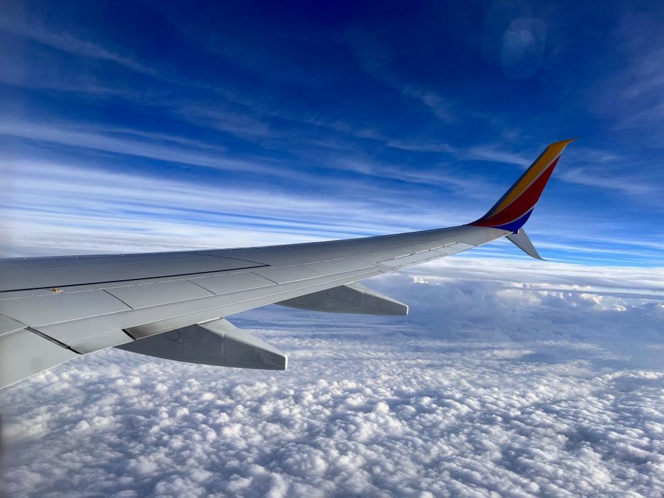 A Southwest plane soars above the clouds en route from New Orleans to Atlanta on Dec. 2, 2023.