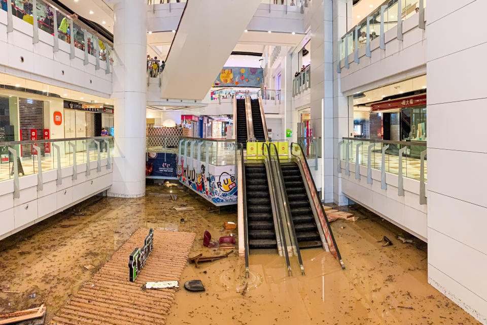 A shopping mall is partially submerged after record-breaking rainfall in Hong Kong. 