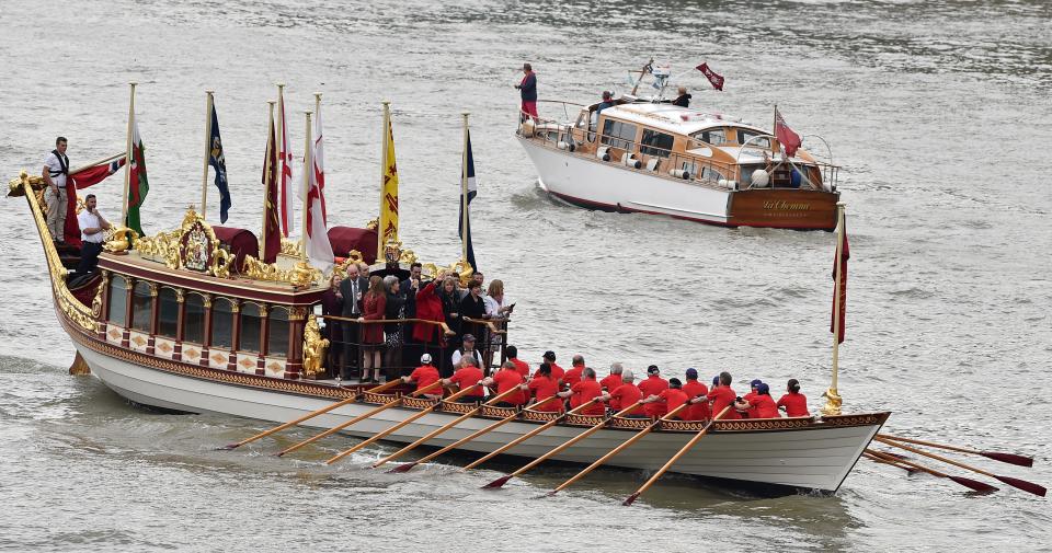 The Royal Barge Gloriana leads a procession along the River Thames in London, on September 9, 2015 to pay tribute to Queen Elizabeth II becoming Britain's longest-reigning monarch. Britain celebrated Queen Elizabeth II becoming the country's longest-serving monarch with a flotilla down the River Thames, a gun salute and the peal of Westminster Abbey's bells. AFP PHOTO / BEN STANSALL        (Photo credit should read BEN STANSALL/AFP via Getty Images)