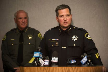 Sacramento County Sheriff Scott Jones speaks to reporters at a news conference after Luis Enrique Monroy-Bracamonte and Janelle Marquez Monroy were charged with murder, attempted murder and carjacking in Sacramento, October 28, 2014. REUTERS/Max Whittaker