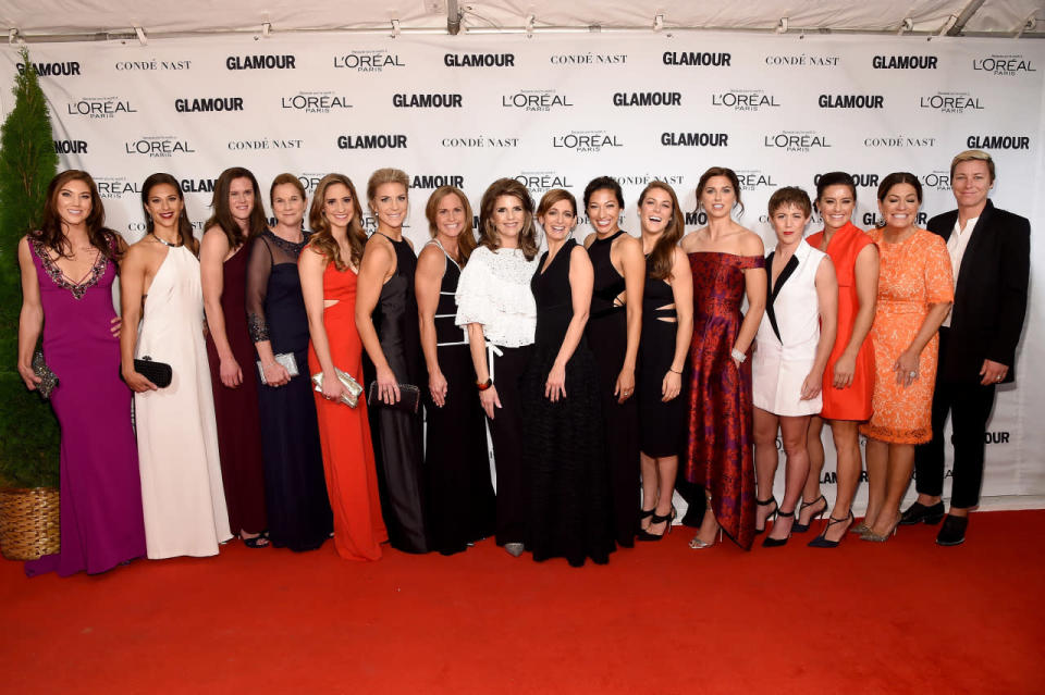 The U.S. Women’s National Soccer Team, who traded their uniforms for dresses and cleats for heels, at the 2015 Glamour Women Of The Year Awards.