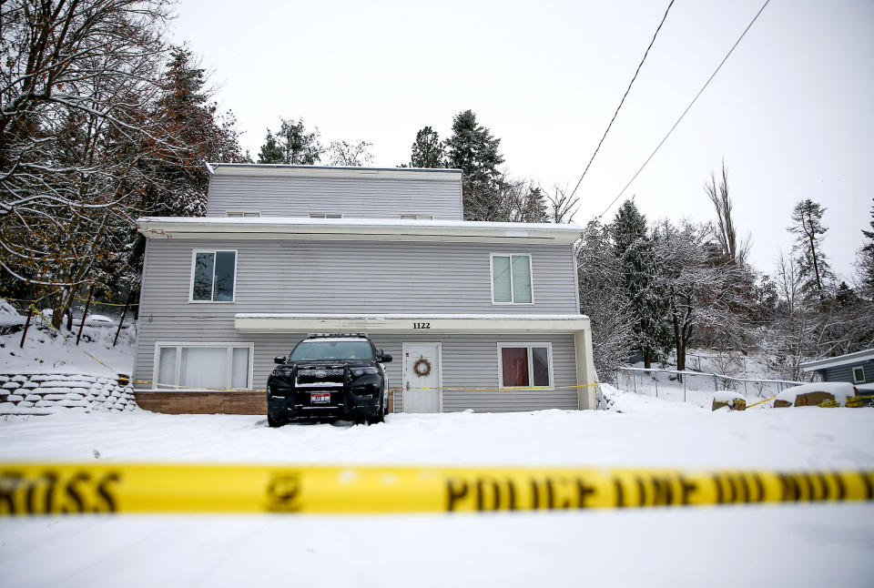 Moscow Police monitor the residence where four University of Idaho students were killed in Moscow, Idaho, on Nov. 30, 2022.  (Lindsey Wasson / Reuters / Alamy file)