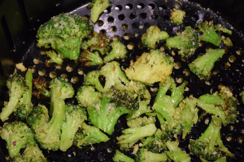 The air that circulates in the air fryer helps dry out frozen broccoli, helping you achieve the crispy florets you crave. (Vidya Rao)