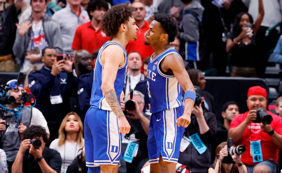 Duke’s Tyrese Proctor (5) and Jeremy Roach (3) celebrate late in the second half of Duke’s 54-51 victory over Houston in their NCAA Tournament Sweet 16 game at the American Airlines Center in Dallas, Texas, Friday, March 29, 2024.