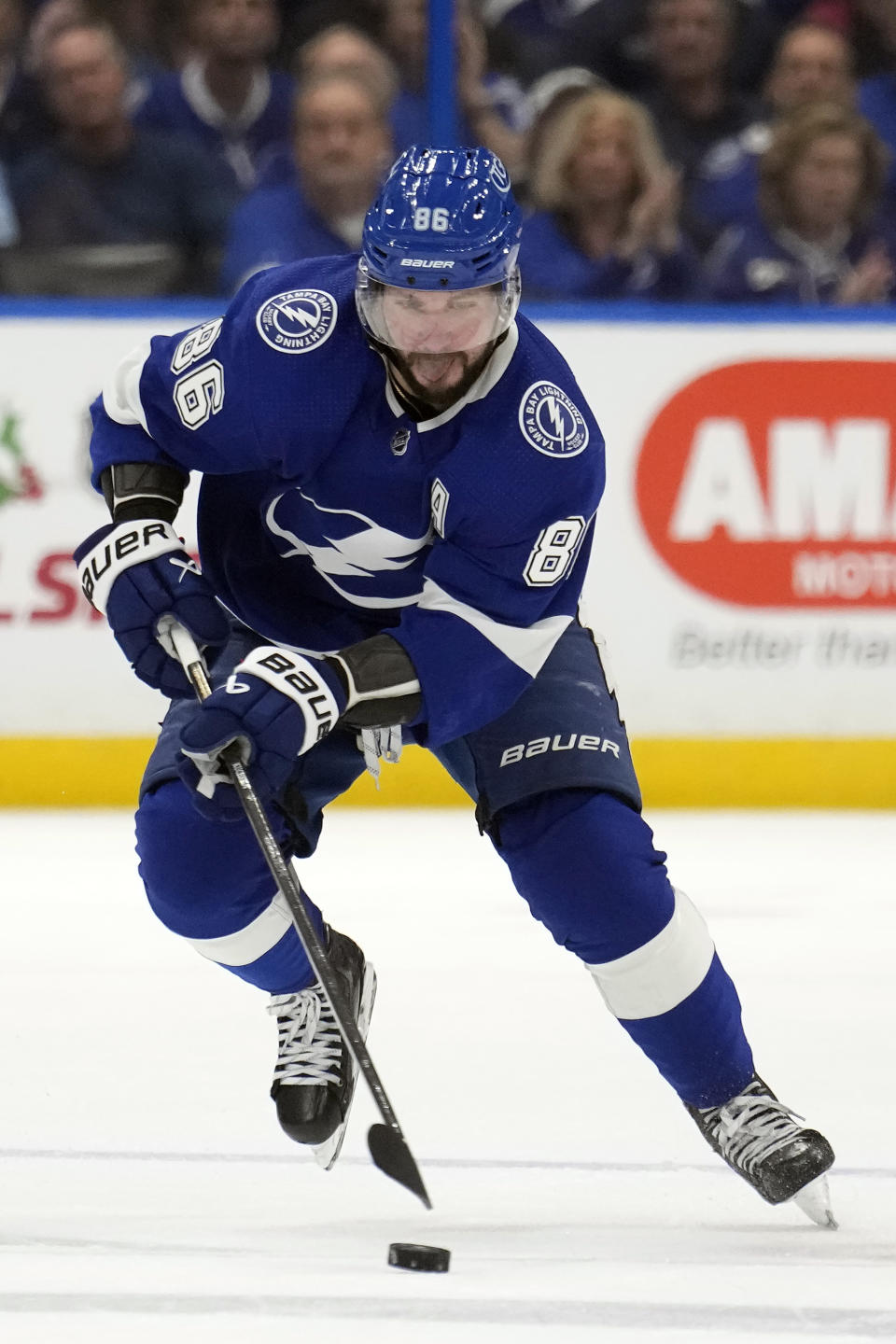 Tampa Bay Lightning right wing Nikita Kucherov (86) moves the puck against the Dallas Stars during the second period of an NHL hockey game Monday, Dec. 4, 2023, in Tampa, Fla. (AP Photo/Chris O'Meara)